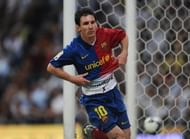 Lionel Messi celebrates scoring his Barcelonas fifth goal against Real Madrid at the Santiago Bernabeu